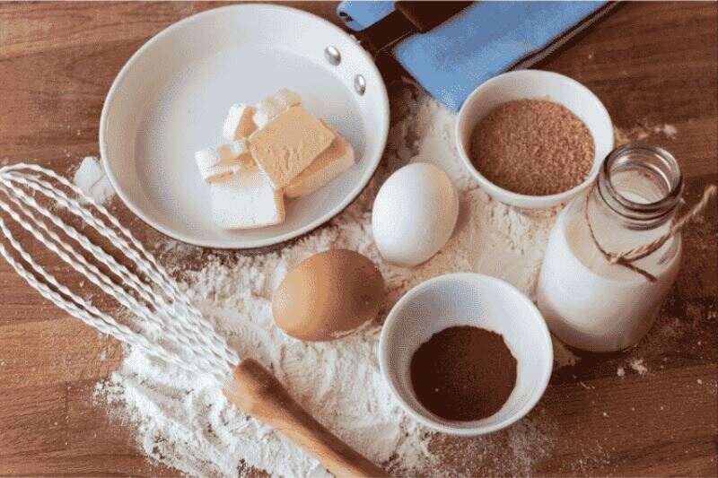 Butter, eggs, milk, ingredients and utensils 