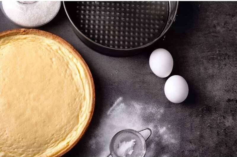 eggs, flours, and utensils for cheesecake