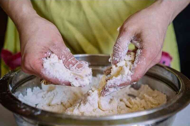 Mixing flour by hands