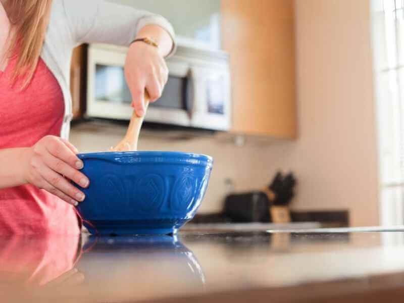 Mixing ingredients in a mixing bowl.