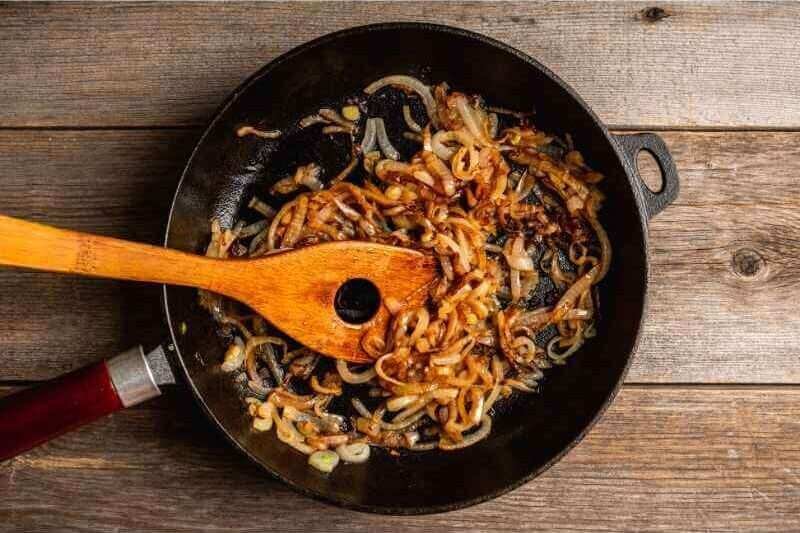 Caramelizing onions and garlic with tomato paste.