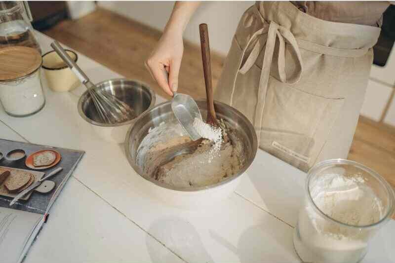 Add butter and flour your cake pan