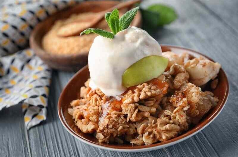 Apple Cranberry Dump Cake with ice cream serve it