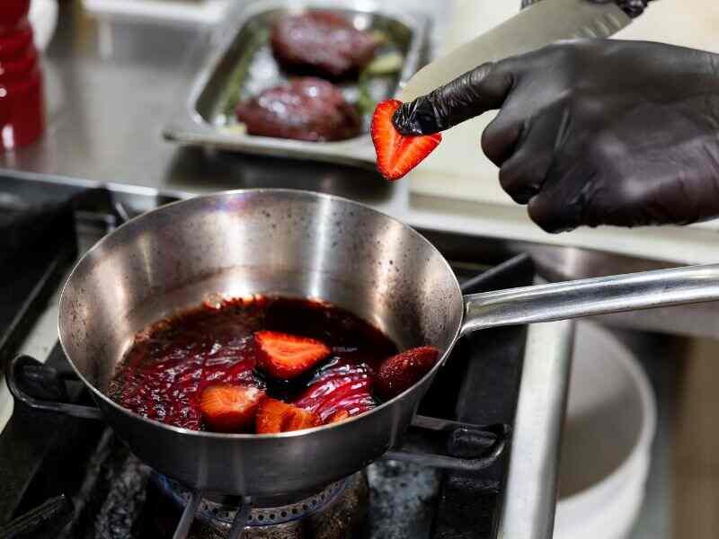 Let cook until the strawberries break down