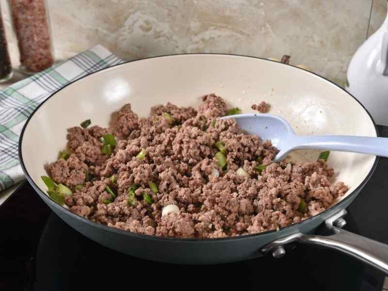 chopped onion, bell pepper, and minced garlic into the pot