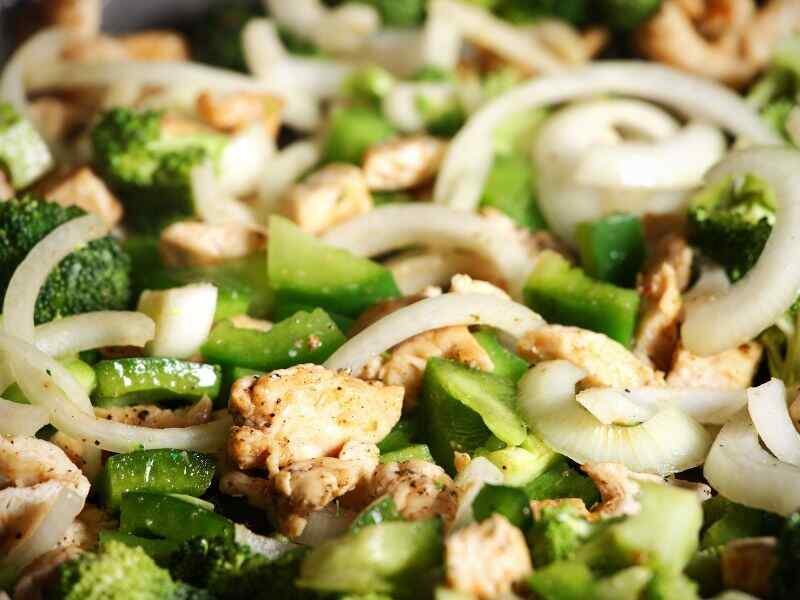 place the broccoli, red onion, cheddar cheese, sunflower seeds, and diced chicken in a large bowl