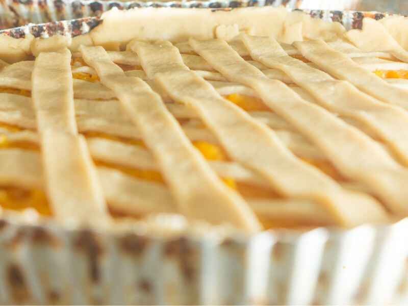 Slice and create a lattice or stripe on the top of the pie.