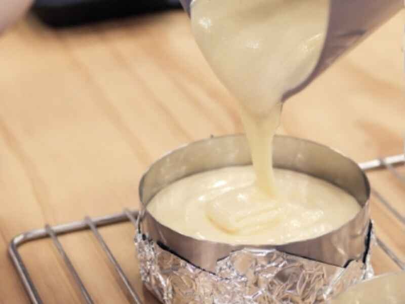 Spoon the batter into the prepared loaf tin