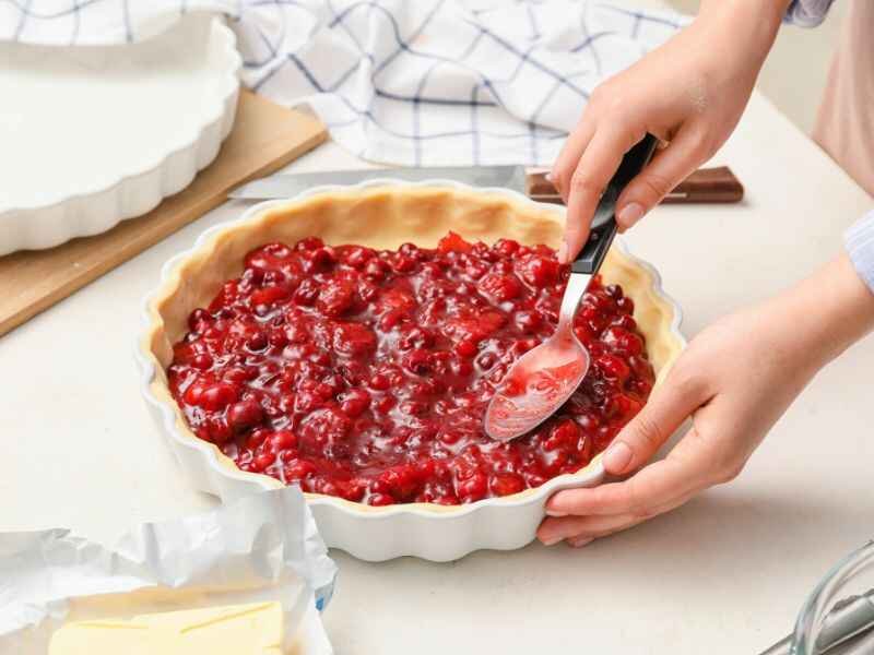 pour the cherry mixture evenly over the crust layer